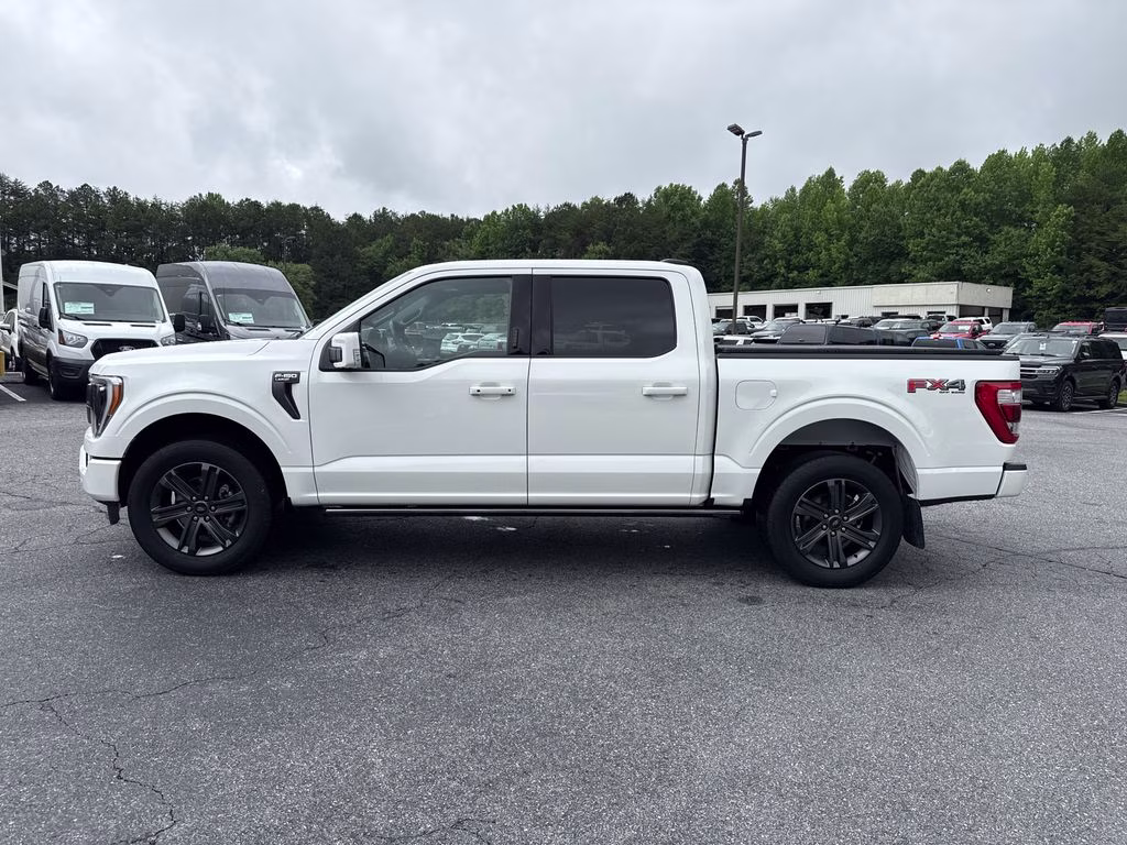 2023 Star White Metallic Tri-Coat Ford F-150 Lariat 4X4 Truck