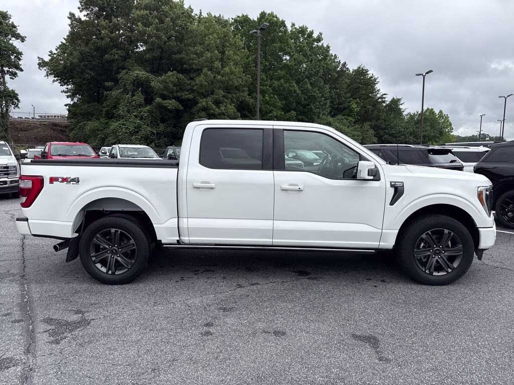 2023 Star White Metallic Tri-Coat Ford F-150 Lariat 4X4 Truck