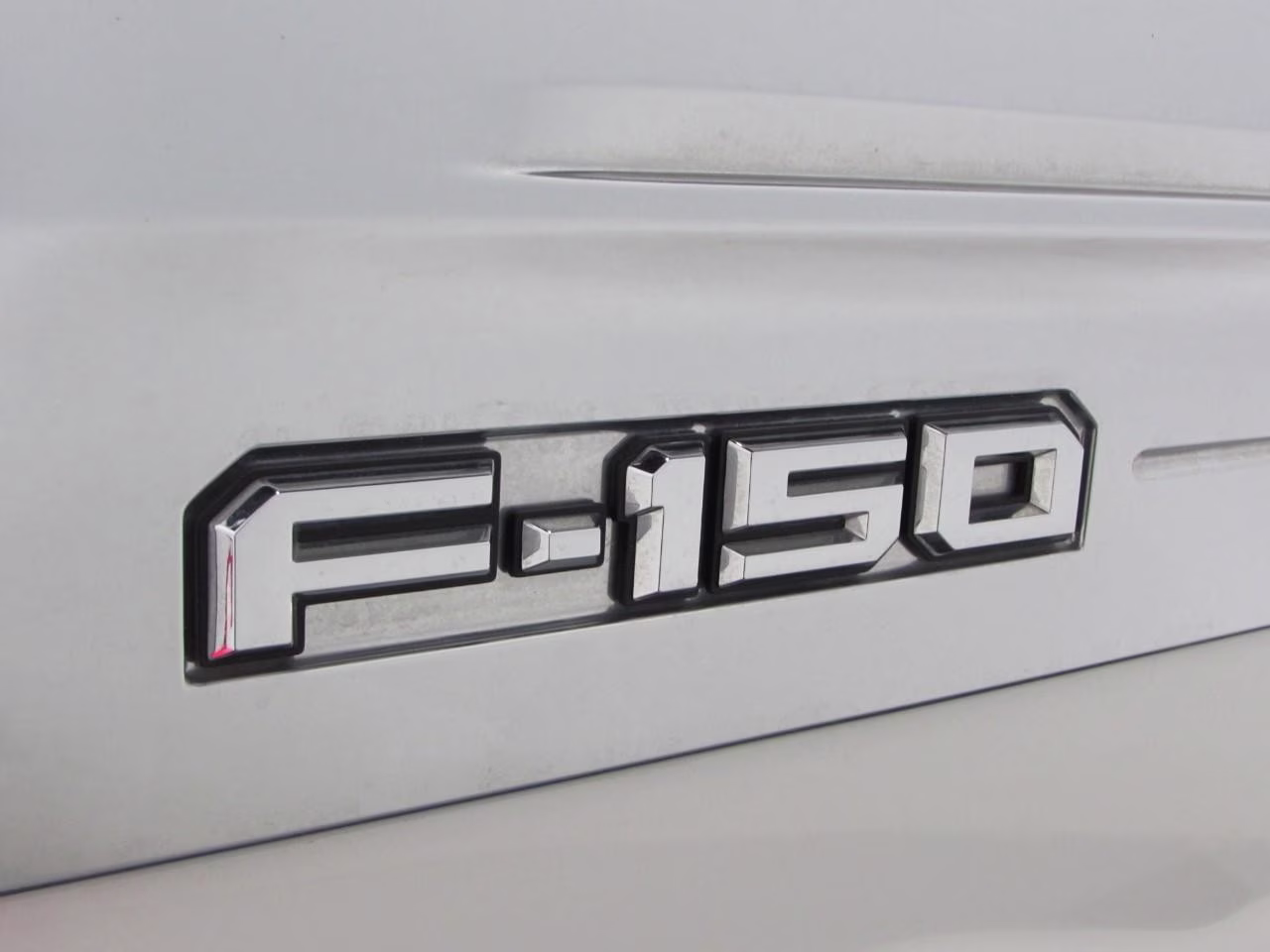 2023 Star White Metallic Tri-Coat Ford F-150 Limited 4X4 Truck