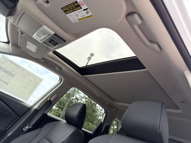 2026 Everest White Pearl Tricoat Nissan Rogue Dark Armor AWD SUV