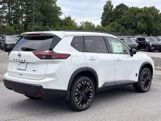 2026 Everest White Pearl Tricoat Nissan Rogue Dark Armor AWD SUV