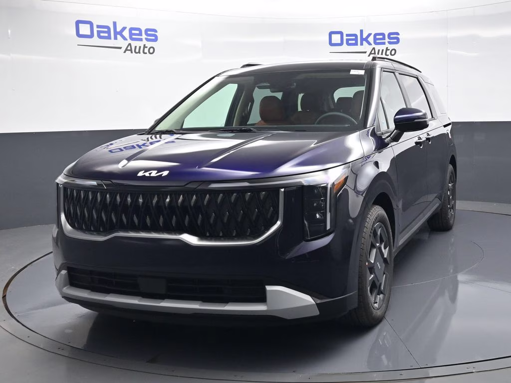 2026 Deep Chroma Blue Kia Carnival Hybrid EX FWD Van