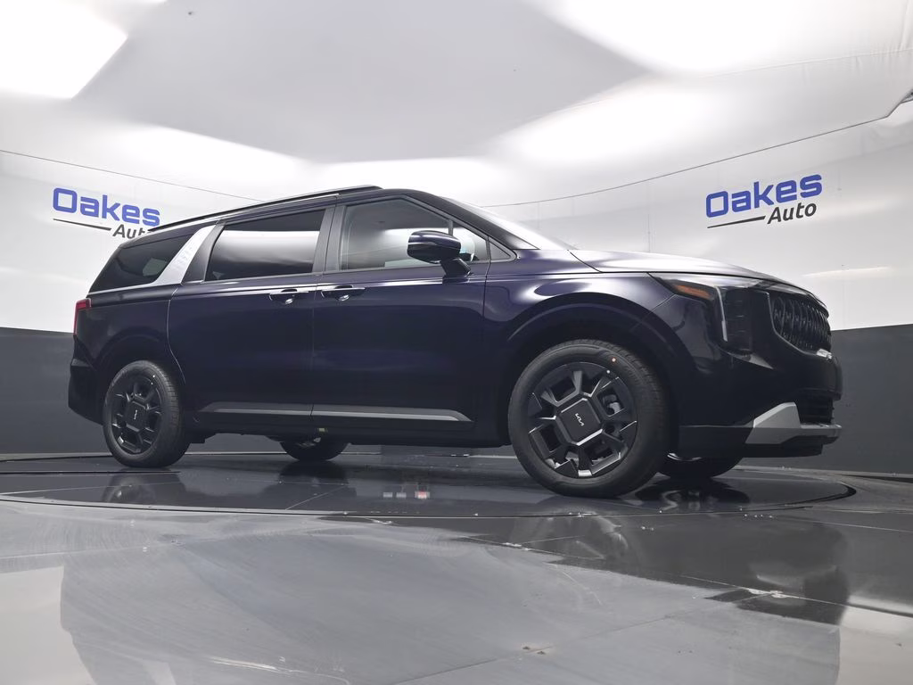 2026 Deep Chroma Blue Kia Carnival Hybrid EX FWD Van
