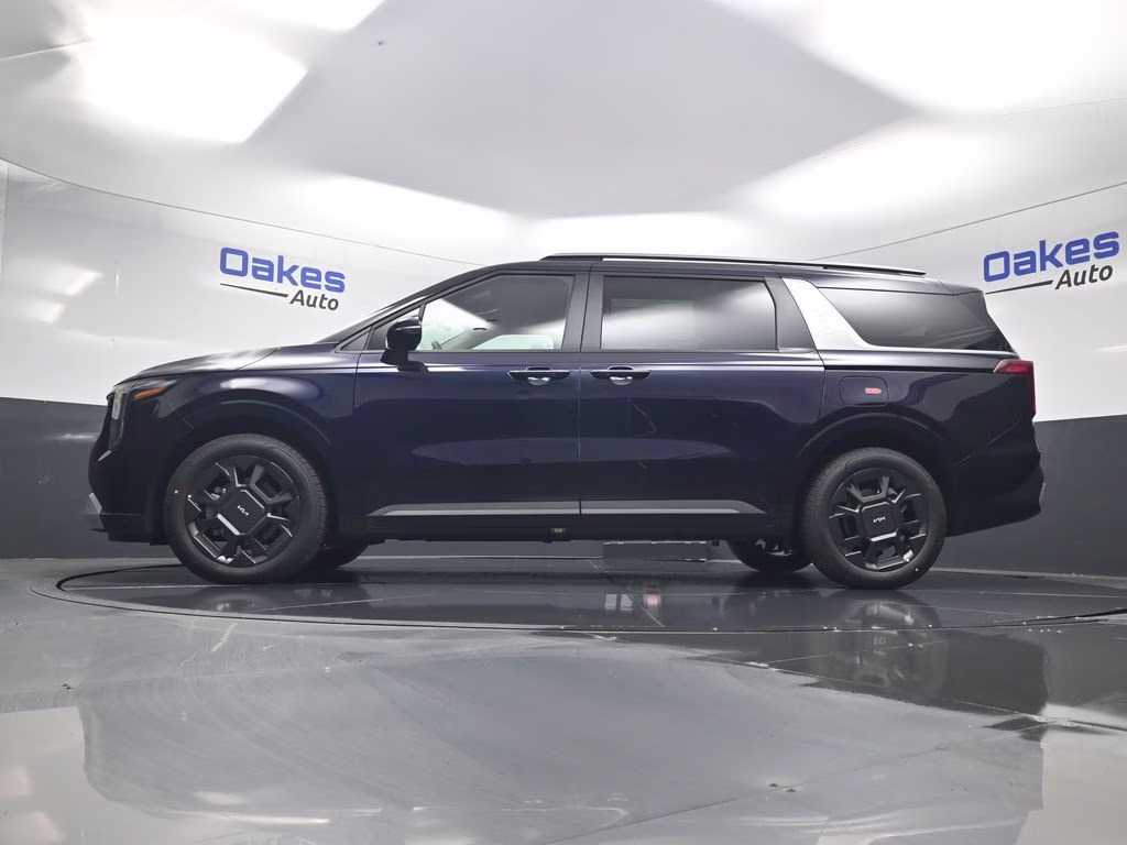 2026 Deep Chroma Blue Kia Carnival Hybrid EX FWD Van