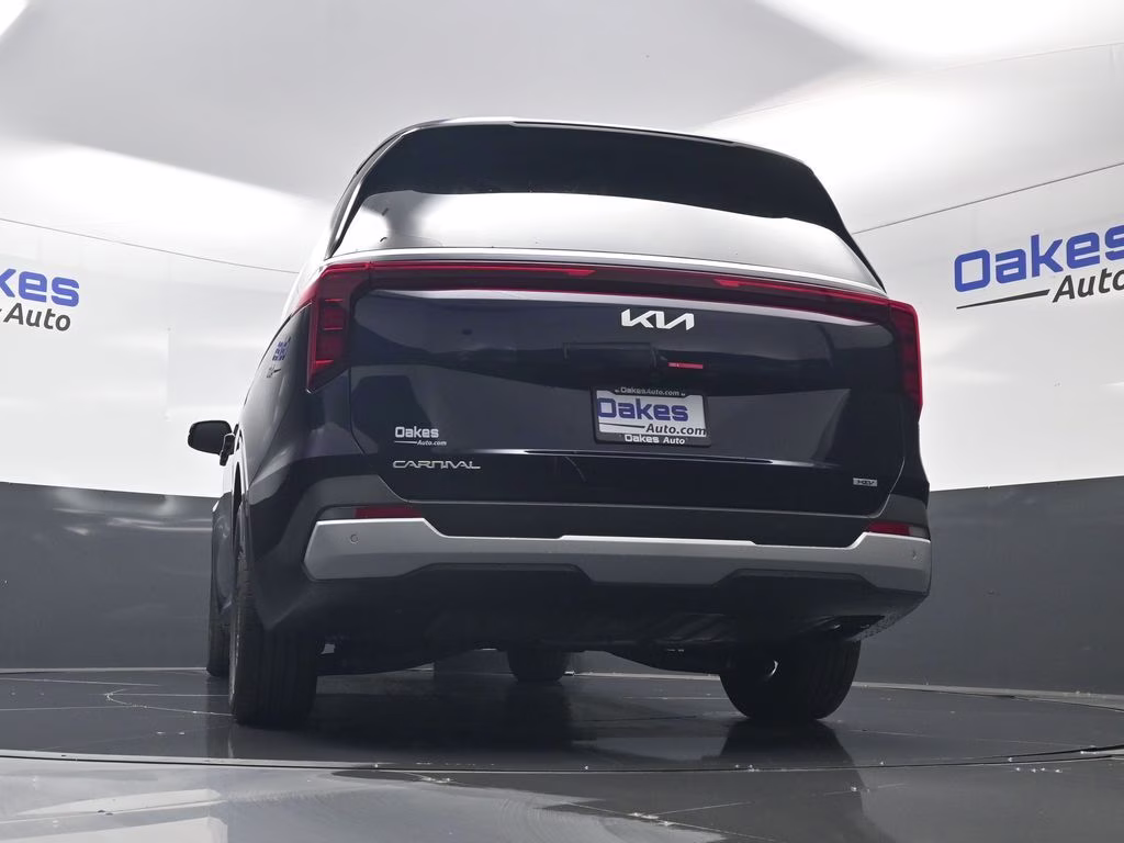 2026 Deep Chroma Blue Kia Carnival Hybrid EX FWD Van
