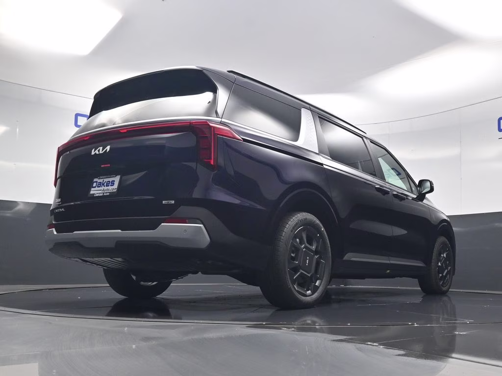2026 Deep Chroma Blue Kia Carnival Hybrid EX FWD Van