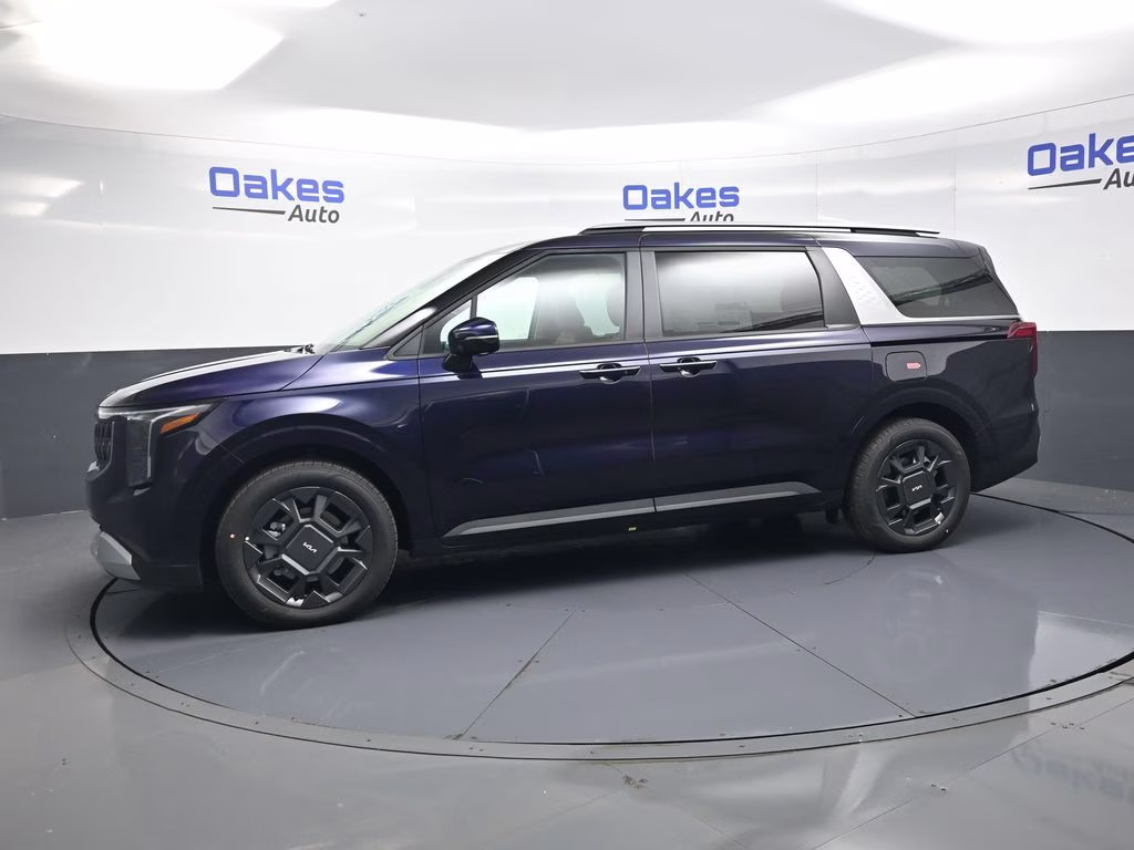 2026 Deep Chroma Blue Kia Carnival Hybrid EX FWD Van