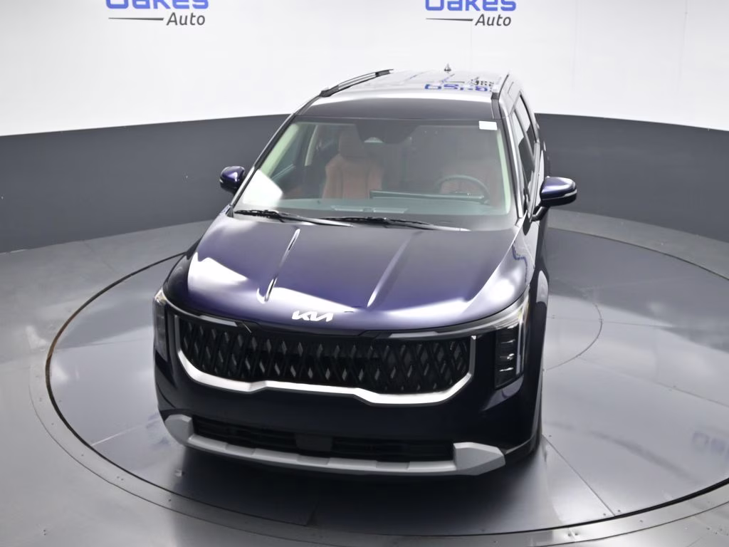 2026 Deep Chroma Blue Kia Carnival Hybrid EX FWD Van