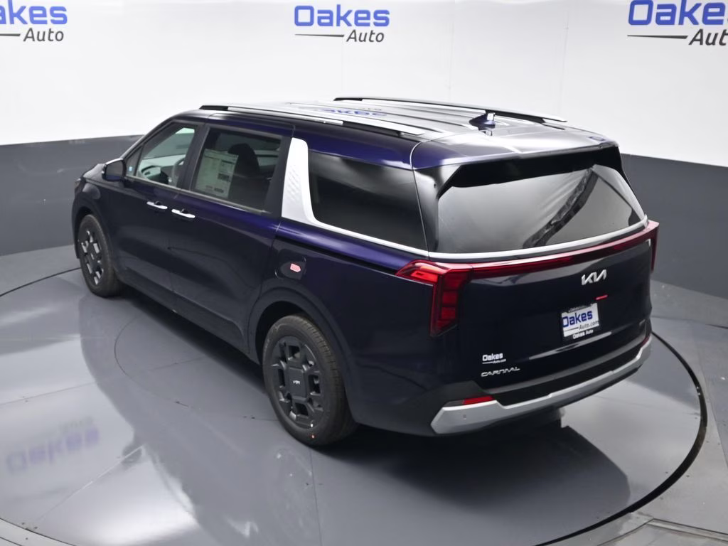 2026 Deep Chroma Blue Kia Carnival Hybrid EX FWD Van