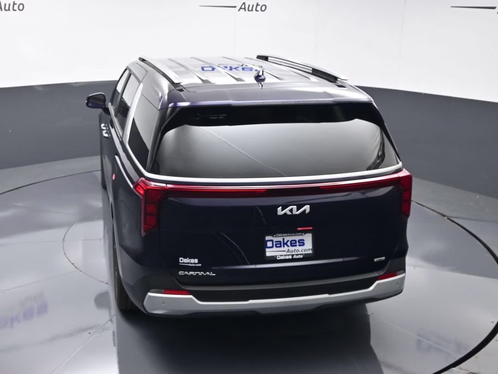 2026 Deep Chroma Blue Kia Carnival Hybrid EX FWD Van