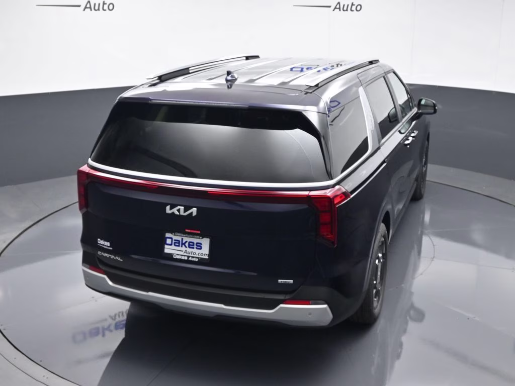 2026 Deep Chroma Blue Kia Carnival Hybrid EX FWD Van
