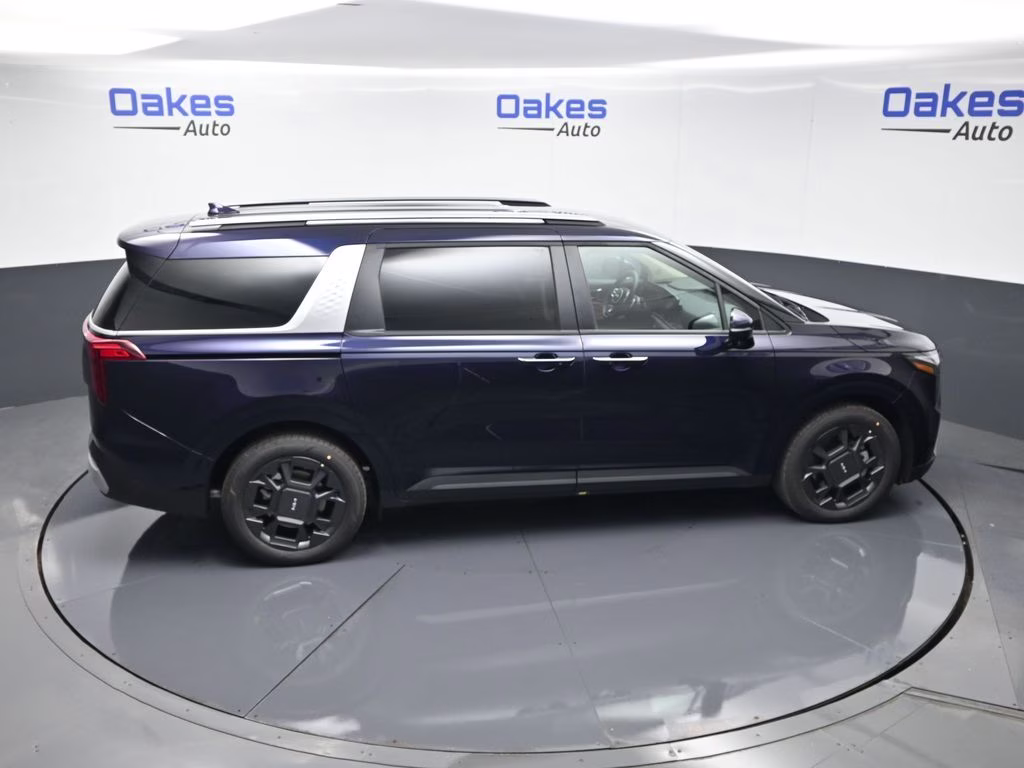 2026 Deep Chroma Blue Kia Carnival Hybrid EX FWD Van