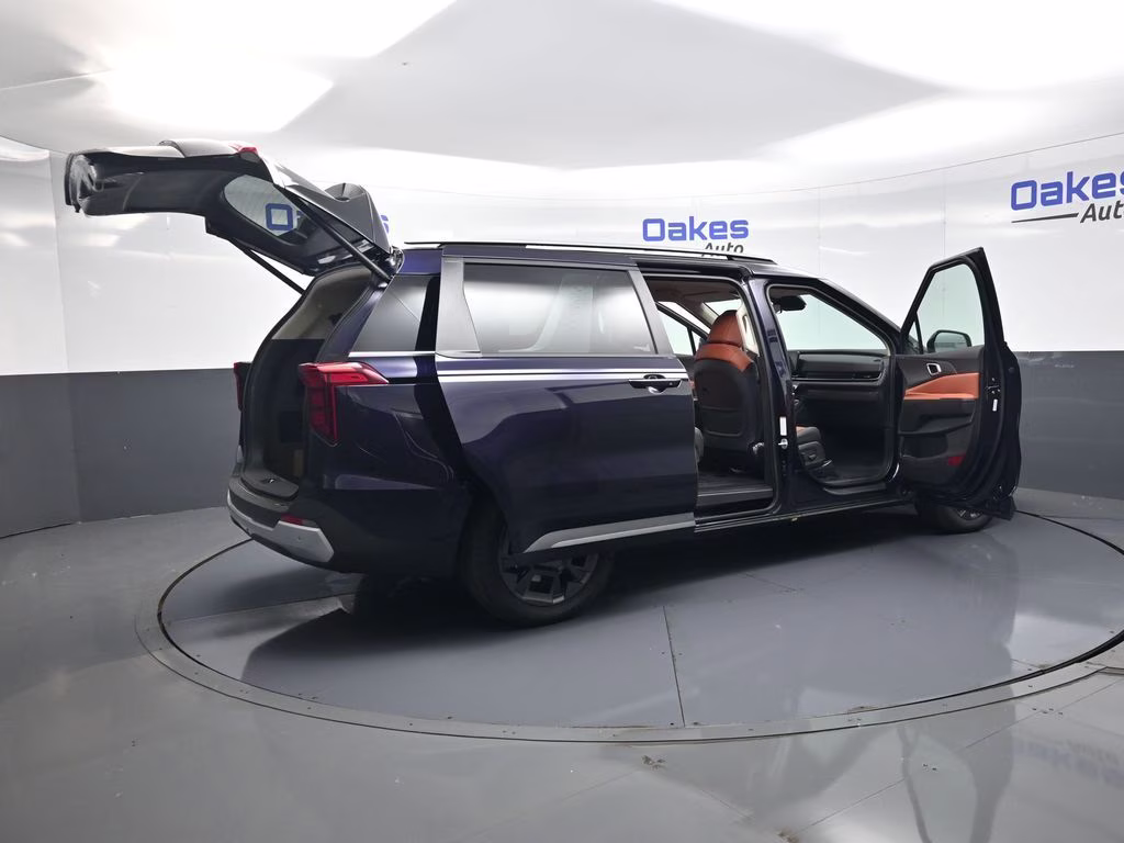 2026 Deep Chroma Blue Kia Carnival Hybrid EX FWD Van