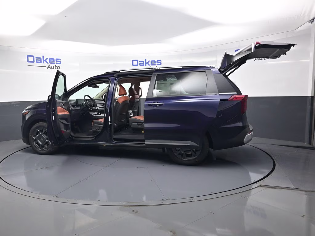 2026 Deep Chroma Blue Kia Carnival Hybrid EX FWD Van