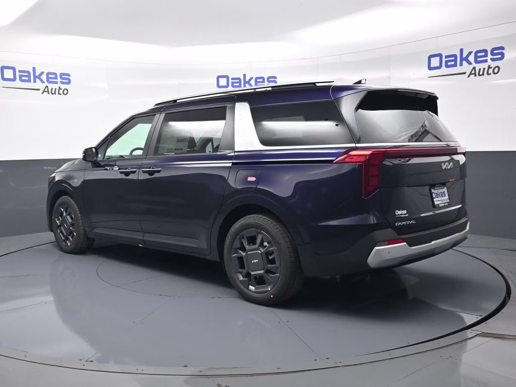 2026 Deep Chroma Blue Kia Carnival Hybrid EX FWD Van