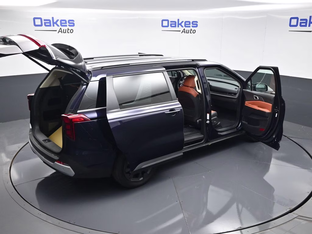 2026 Deep Chroma Blue Kia Carnival Hybrid EX FWD Van