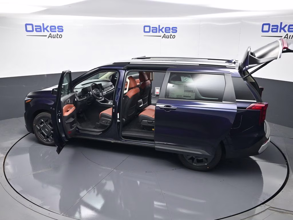 2026 Deep Chroma Blue Kia Carnival Hybrid EX FWD Van