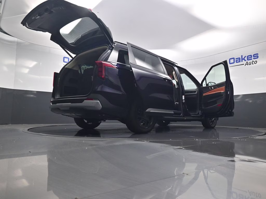 2026 Deep Chroma Blue Kia Carnival Hybrid EX FWD Van