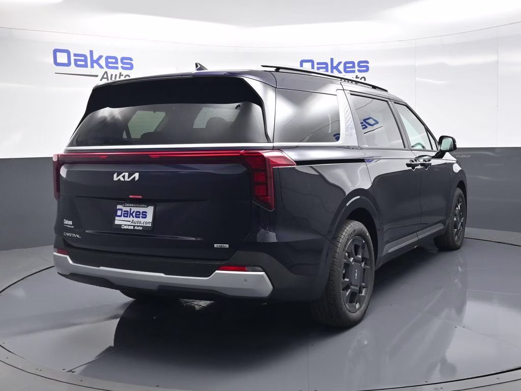 2026 Deep Chroma Blue Kia Carnival Hybrid EX FWD Van
