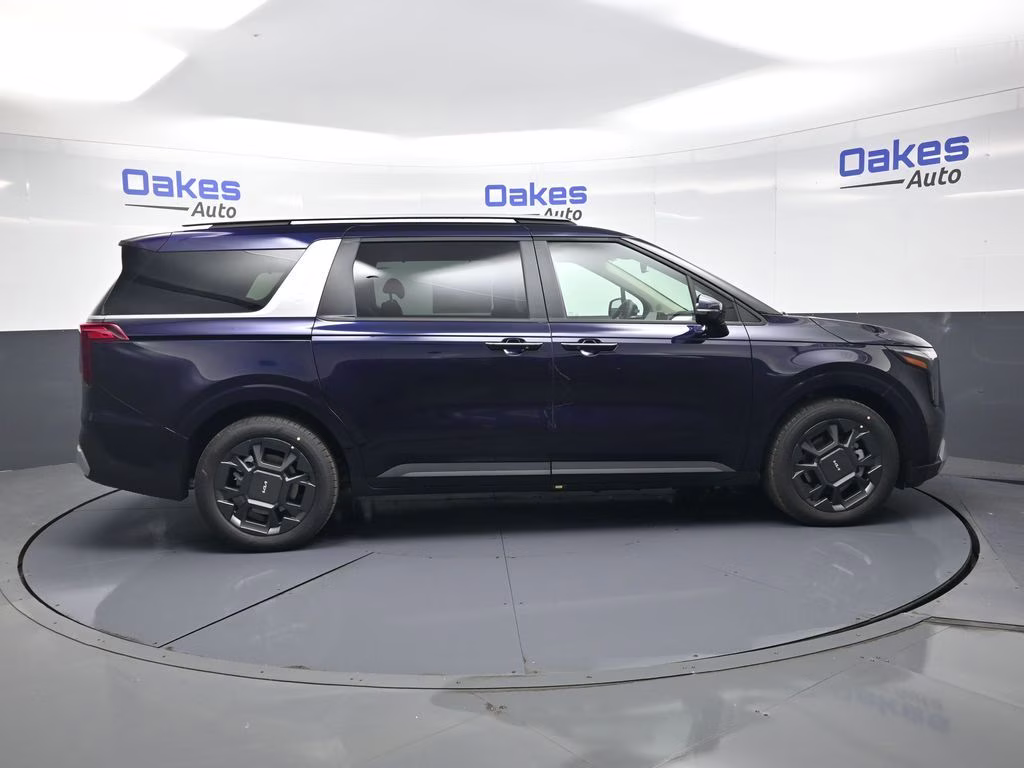 2026 Deep Chroma Blue Kia Carnival Hybrid EX FWD Van