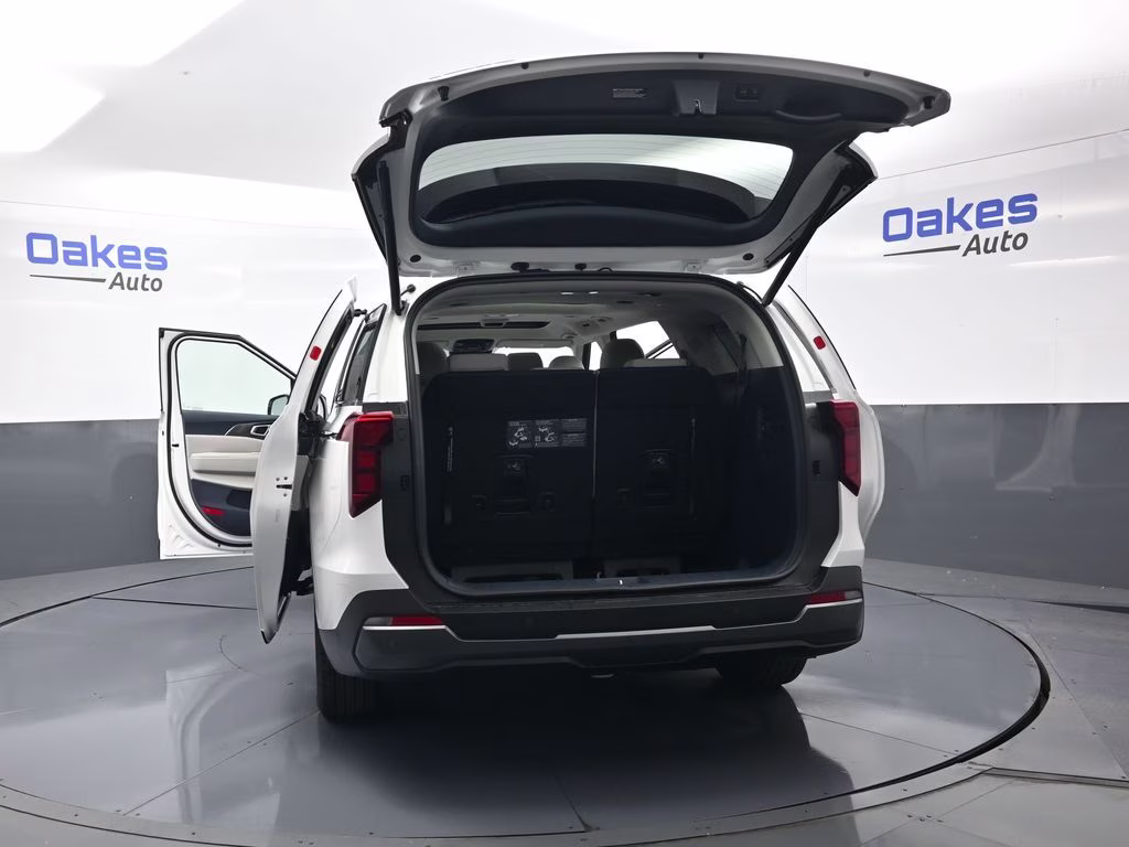 2026 Snow White Pearl Kia Carnival Hybrid SX FWD Van