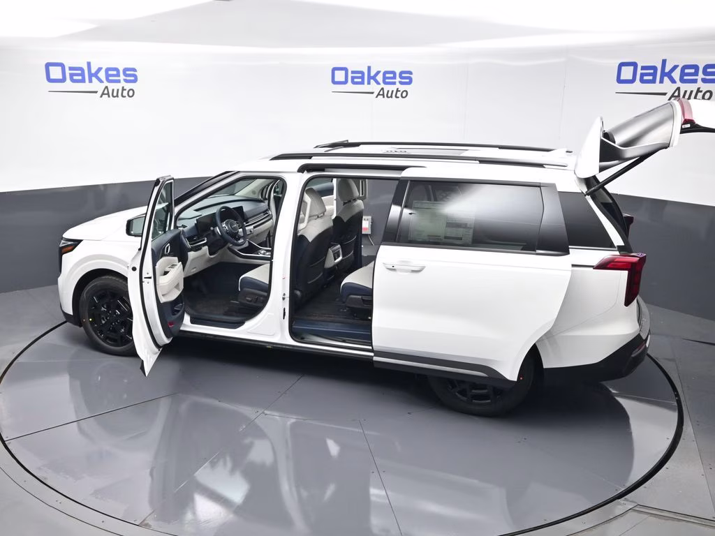 2026 Snow White Pearl Kia Carnival Hybrid SX FWD Van