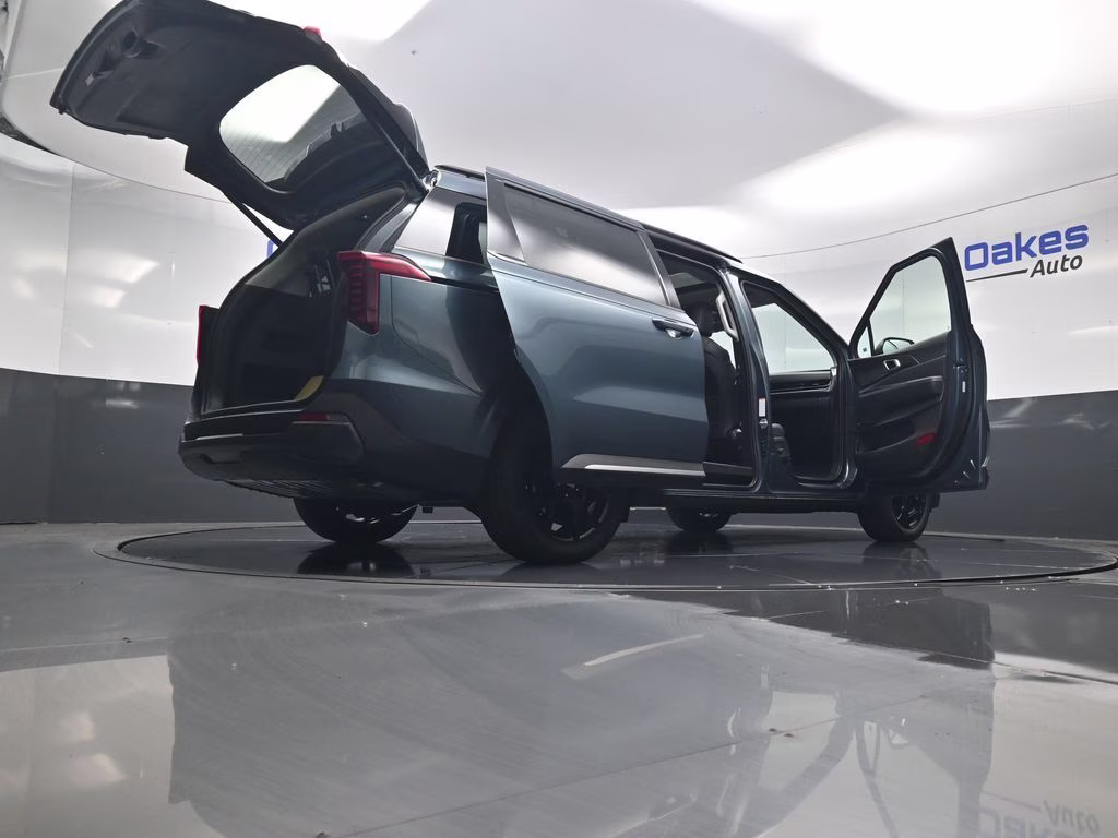 2026 Astra Blue Kia Carnival Hybrid SX Prestige FWD Van