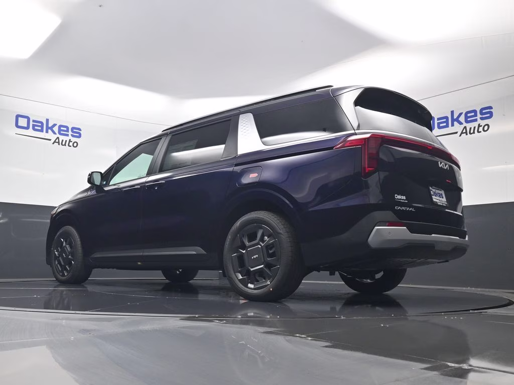 2026 Deep Chroma Blue Kia Carnival Hybrid EX FWD Van