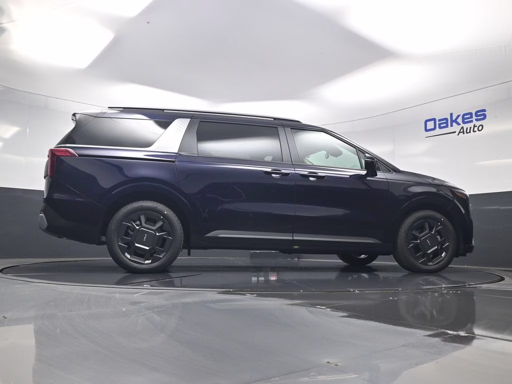 2026 Deep Chroma Blue Kia Carnival Hybrid EX FWD Van