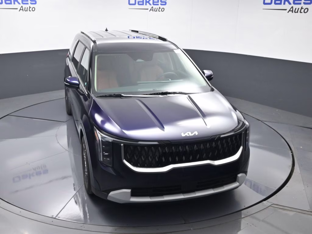 2026 Deep Chroma Blue Kia Carnival Hybrid EX FWD Van