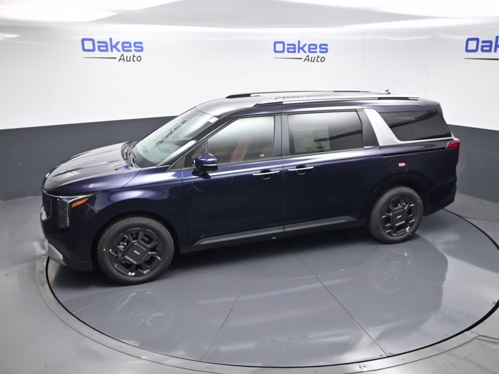 2026 Deep Chroma Blue Kia Carnival Hybrid EX FWD Van