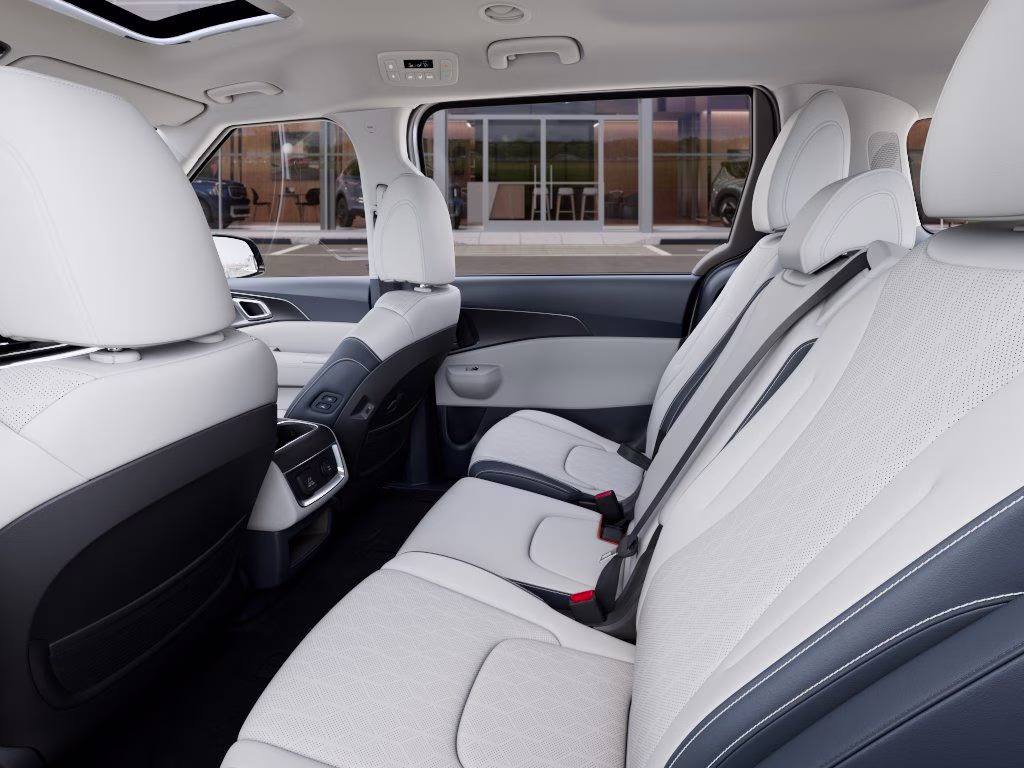 2026 Snow White Pearl Kia Carnival Hybrid SX FWD Van
