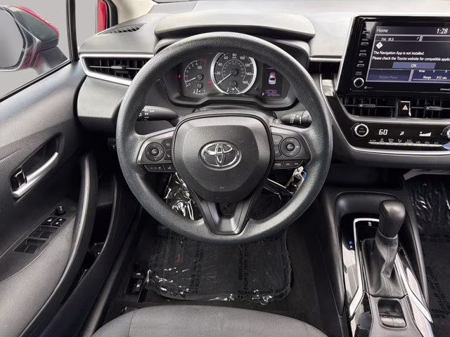 2021 Barcelona Red Metallic Toyota Corolla LE FWD Sedan