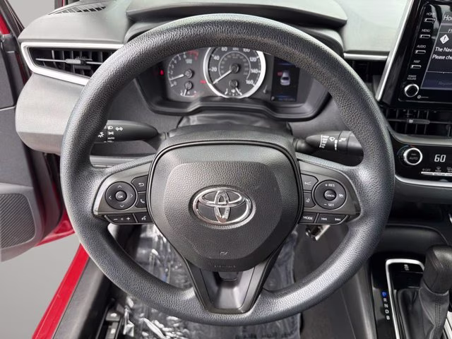 2021 Barcelona Red Metallic Toyota Corolla LE FWD Sedan