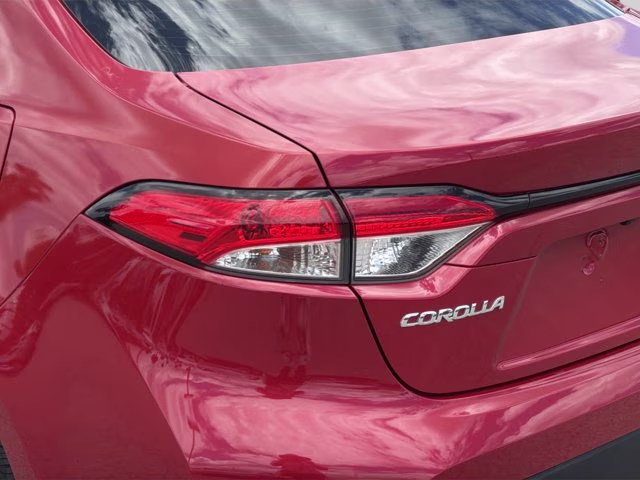2021 Barcelona Red Metallic Toyota Corolla LE FWD Sedan