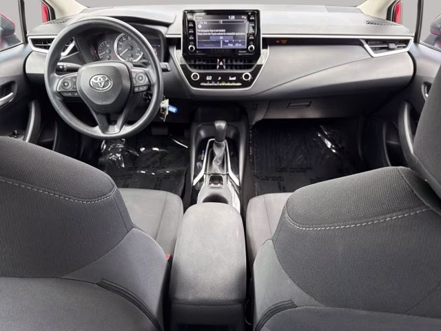 2021 Barcelona Red Metallic Toyota Corolla LE FWD Sedan