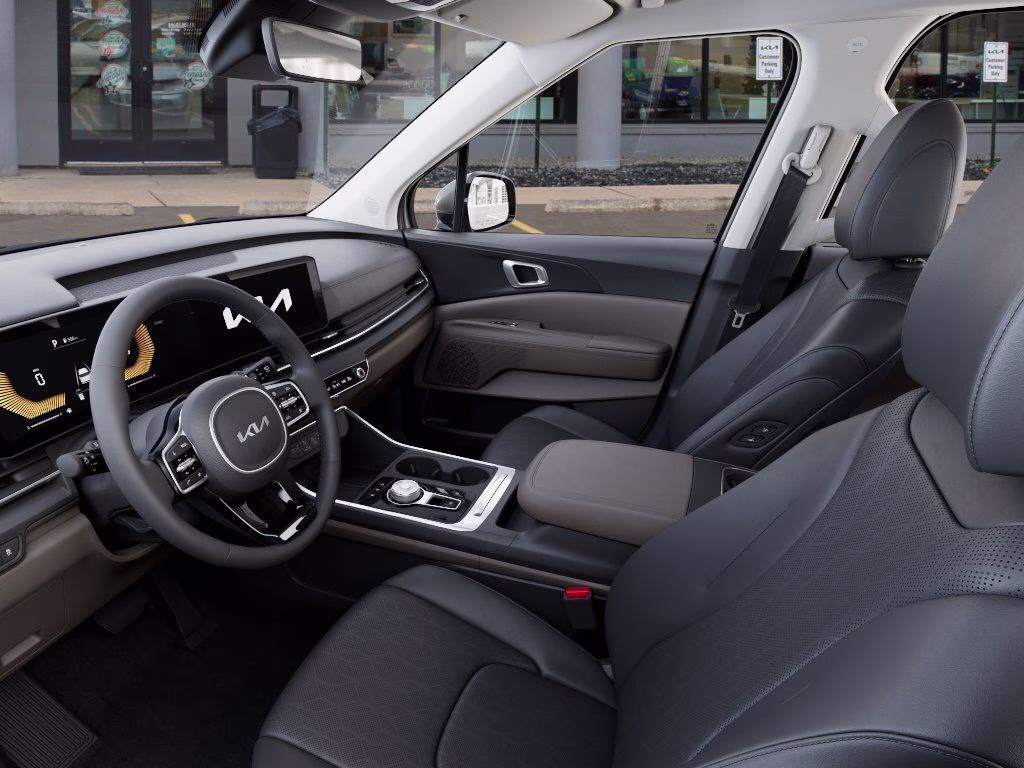2026 Ivory Silver Kia Carnival Hybrid EX FWD Van