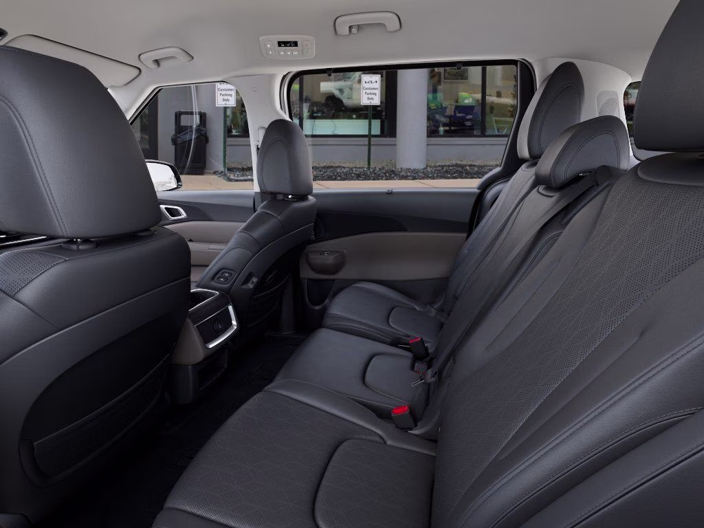 2026 Ivory Silver Kia Carnival Hybrid EX FWD Van
