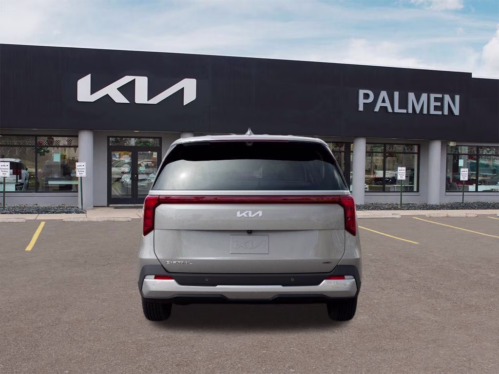 2026 Ivory Silver Kia Carnival Hybrid EX FWD Van