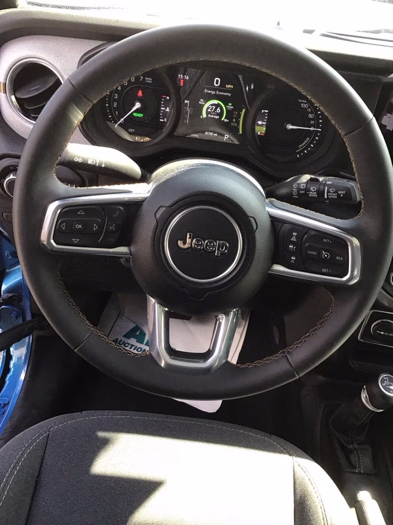 2024 Hydro Blue Pearl Coat Jeep Wrangler Sahara 4xe 4X4 SUV