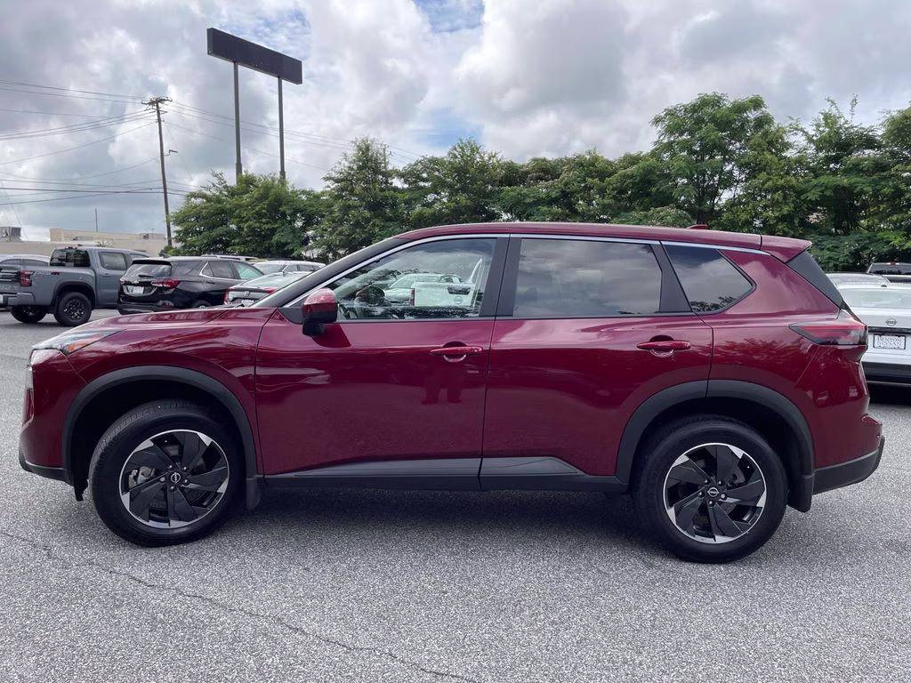 2025 Scarlet Ember Tintcoat Nissan Rogue SV FWD SUV