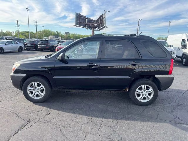 2008 Black Cherry Metallic Kia Sportage LX 4X4 SUV
