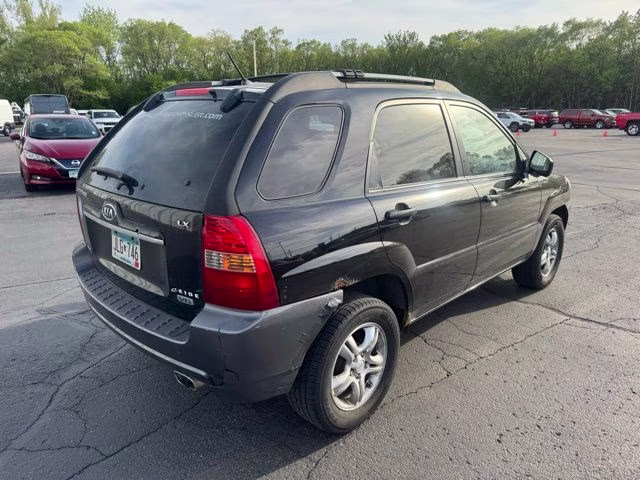 2008 Black Cherry Metallic Kia Sportage LX 4X4 SUV