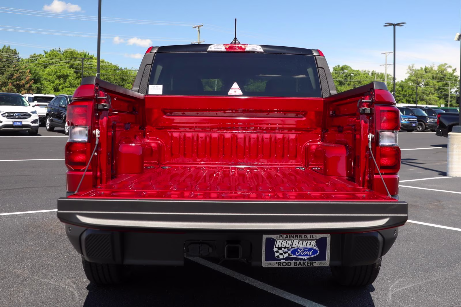 2026 Ruby Red Metallic Tinted Clearcoat Ford Maverick XLT AWD Truck