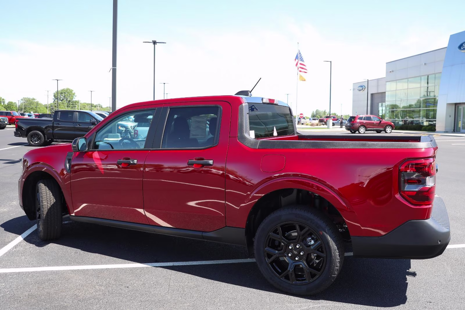 2026 Ruby Red Metallic Tinted Clearcoat Ford Maverick XLT AWD Truck