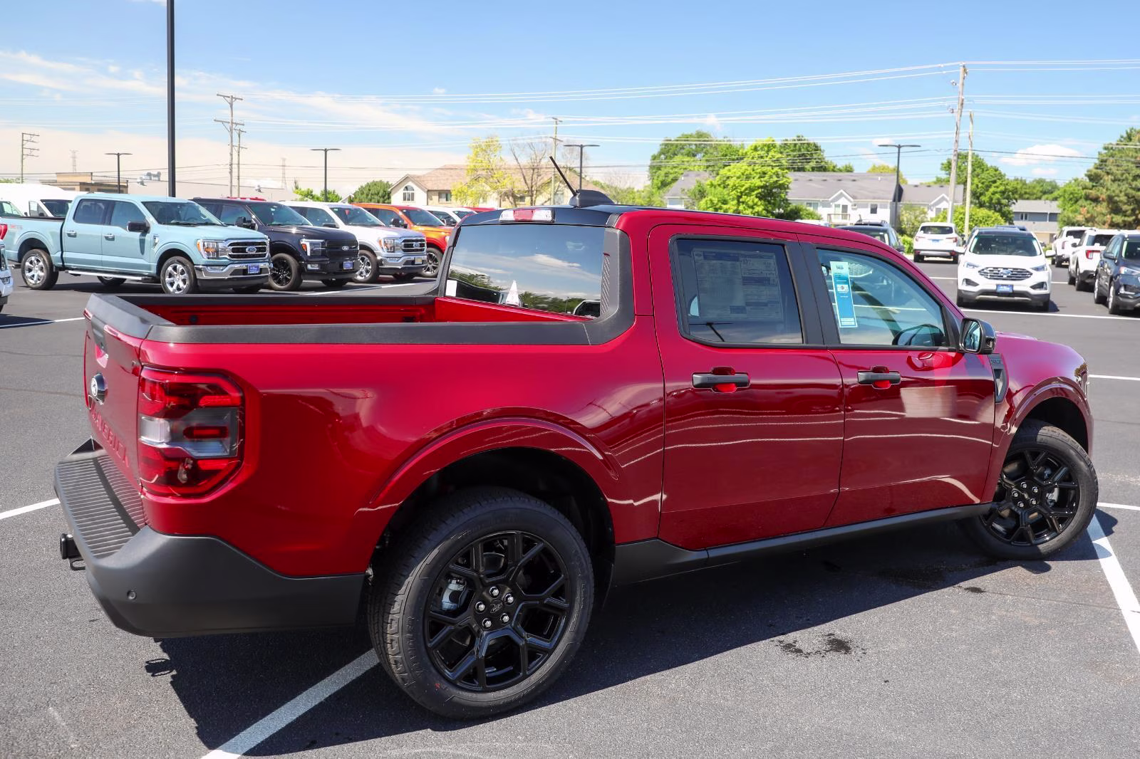 2026 Ruby Red Metallic Tinted Clearcoat Ford Maverick XLT AWD Truck