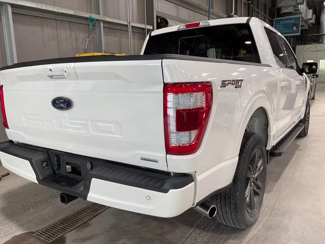 2023 Star White Metallic Tri-Coat Ford F-150 Lariat 4X4 Truck
