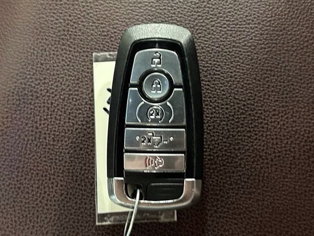2023 Star White Metallic Tri-Coat Ford F-150 Lariat 4X4 Truck