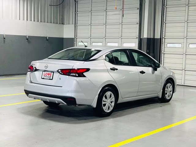 2024 Brilliant Silver Metallic Nissan Versa 1.6 S FWD Sedan