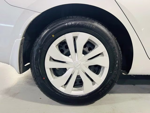 2024 Brilliant Silver Metallic Nissan Versa 1.6 S FWD Sedan